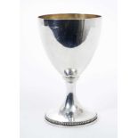 George III silver goblet / chalice of conventional form with gilded interior and raised on circular