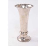 1920s silver trumpet vase, with flared rim and raised girdle, on a loaded circular base,