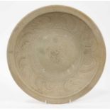 Chinese celadon dish, Yuan dynasty, from the Java shipwreck, with incised floral decoration, 32cm di