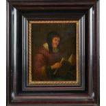 Continental School, 17th century, oil on panel, lady reading, inscription verso attributes the work