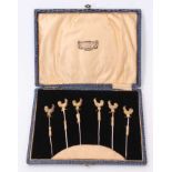 Set of six 1920s silver gilt cocktail sticks in a fitted case