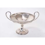 1920s silver twin handled pedestal dish, with pierced and gadrooned border, on a circular base