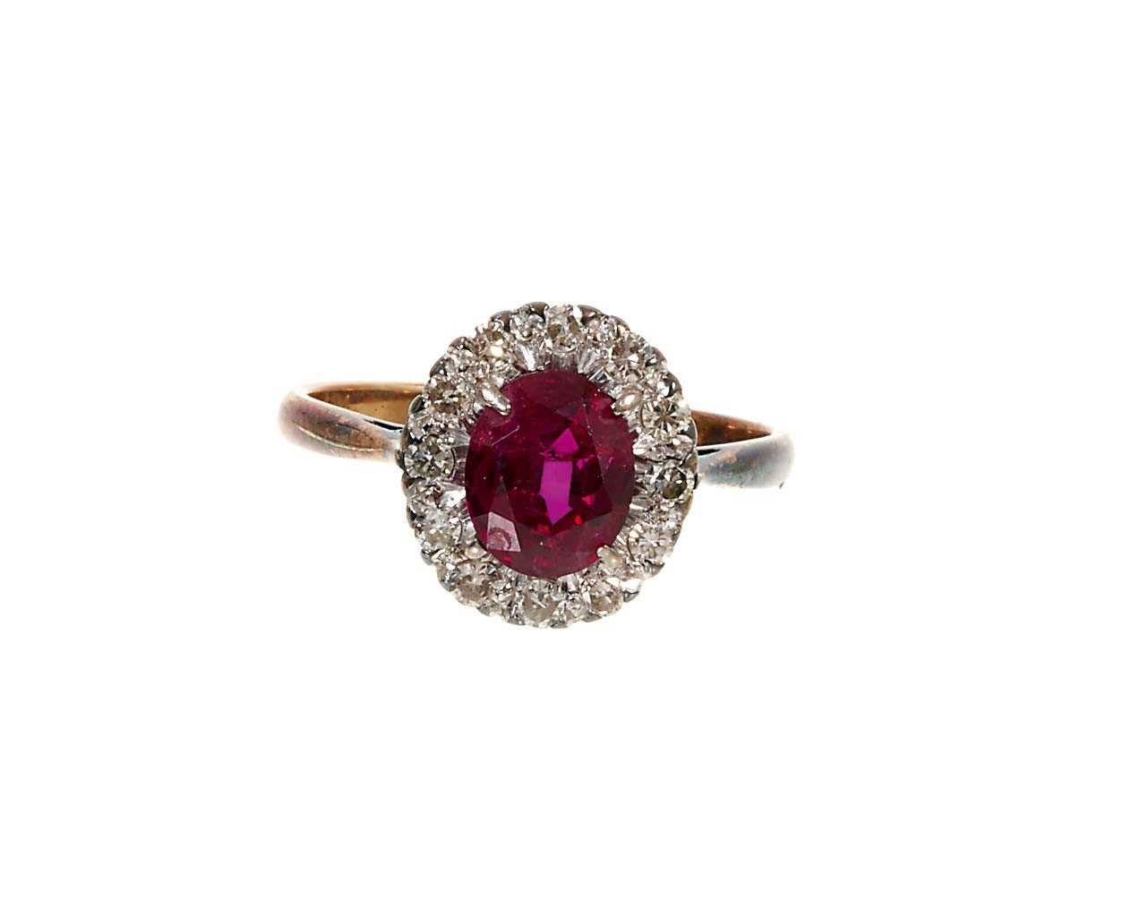 Ruby and diamond cluster ring in platinum claw setting on 18ct yellow gold shank