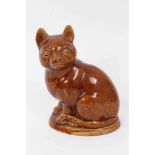 A lead glazed stoneware model of a cat, circa 1820