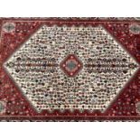 Tekke style rug and two others