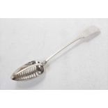 George III Irish silver fiddle pattern straining spoon, with central pierced grille (Dublin 1812)
