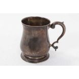 George II silver tankard of baluster form with scroll handle, on circular foot, (London 1748), maker
