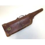 Early 20th century brown leather leg 'o mutton gun case, 79cm long