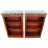 Pair of antique Empire style dwarf marble topped mahogany open bookcases