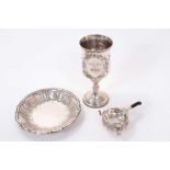 Continental silver (800) dish of circular form, together with a white metal goblet and Middle Easter