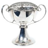 Early George V silver triple handled rose bowl of circular form, on a tall pedestal base