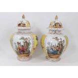 Pair of Dresden lidded vases and covers