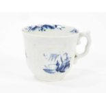 A Worcester blue and white coffee cup, circa 1758, of moulded strap-fluted form with scroll handle,