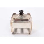 Victorian silver tea caddy of half fluted, rectangular form, with upstanding rim and domed cover