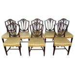 Set of eight Hepplewhite style mahogany shield back dining chairs.