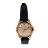 1950s ladies Longines gold wristwatch on black leather strap