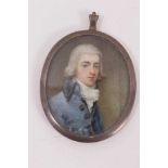 A portrait miniature of a young man, in silver and enamelled frame