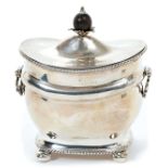 Edwardian silver tea caddy of bombe form, with gadrooned borders and hinged domed cover