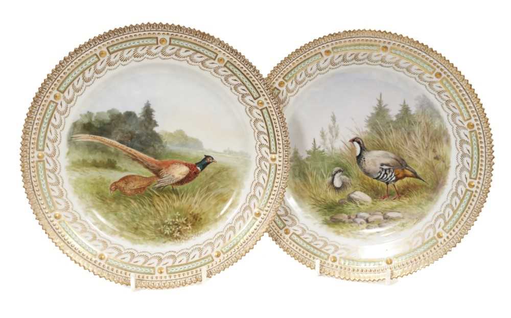 Pair of Royal Copenhagen porcelain dishes painted with game birds.