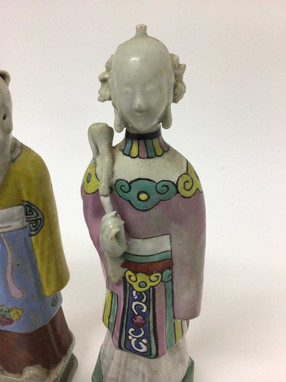 Three Chinese porcelain figures of immortals, Qianlong period, each polychrome decorated and shown s - Image 4 of 9