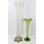 Very tall Victorian glass lily vase and another Victorian green glass lily vase