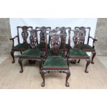 Early 20th century mahogany extending dining table and ensuite set of eight Georgian style dining ch