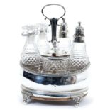 George III silver five piece cruet of oval form, with gadrooned border, central carrying handle