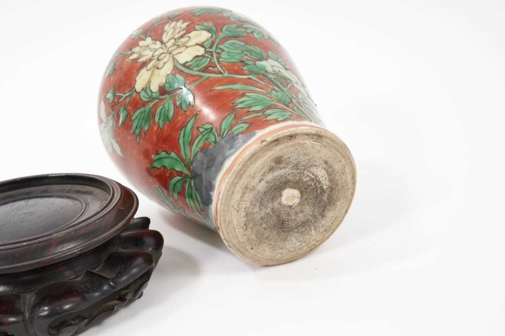 Chinese Wucai baluster jar, 17th century, decorated with a bird in flight amongst rockwork and flowe - Image 4 of 14