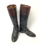 Pair of gentlemans black leather hunting boots with brown tops, size 11