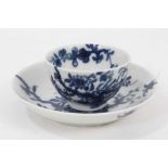 A Worcester miniature blue and white teabowl and saucer, circa 1760, painted with the Prunus Root pa