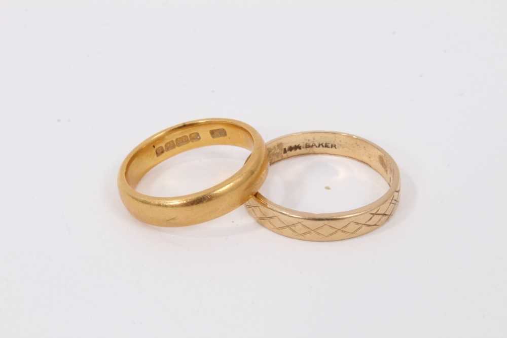 22ct gold wedding ring and a 14k wedding ring