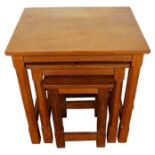 Nest of three Robert 'Mouseman' Thompson adzed oak tables