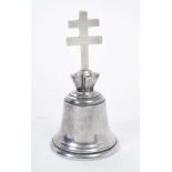 Edwardian silver table bell of conventional form, the handle modelled as a Patriarchal cross, (Londo