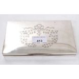 George V silver cigarette box of rectangular form with engraved decoration to hinged cover and cedar