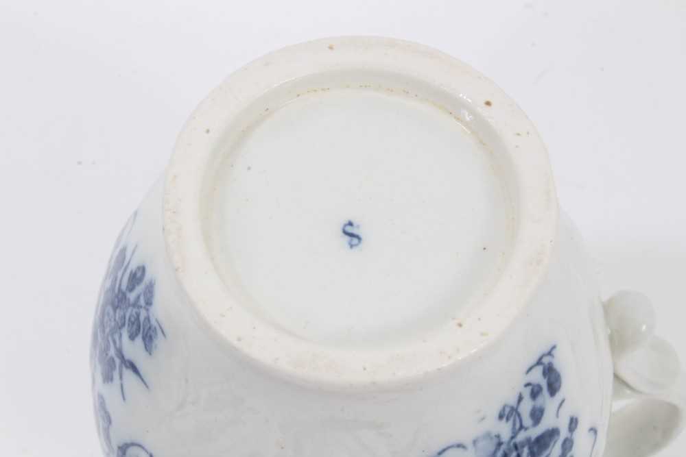 A Caughley blue and white cabbage leaf moulded jug with mask spout, decorated with bouquets of flowe - Image 5 of 5