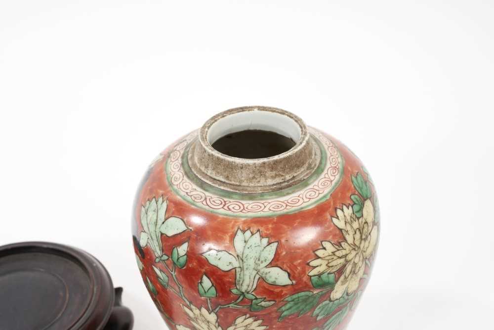 Chinese Wucai baluster jar, 17th century, decorated with a bird in flight amongst rockwork and flowe - Image 3 of 14