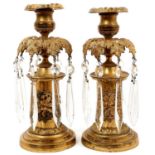 Pair of Regency gilt metal lustres / candlesticks with prismatic glass drops