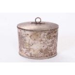 Victorian silver tea caddy of navette form with gadrooned borders and hinged cover with loop handle,