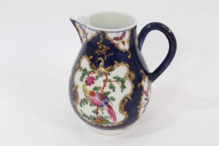 A Worcester sparrow beak jug, circa 1770, polychrome painted with tropical birds on on a scale blue