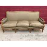 French style beech framed settee with feather upholstery and undulating showwood frame on cabriole l