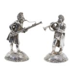 Pair of German silver musician figures, on oval bases with floral and scroll decoration, stamped 835
