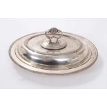 George V silver entree dish of oval form, with egg and dart borders and separate cover.