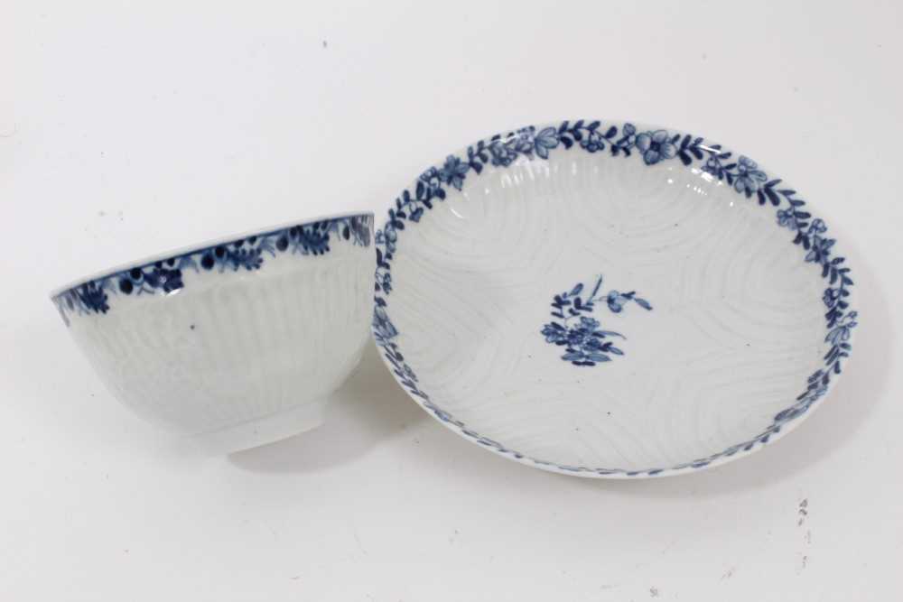 Worcester blue and white moulded tea wares, circa 1780, including a tea bowl and saucer with floral - Image 2 of 11