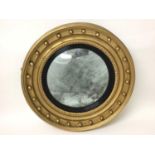 19th century convex gilt framed wall mirror