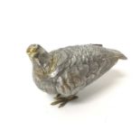 White metal model of a Partridge, some traces of gilding remaining, 16cm long x 9cm high