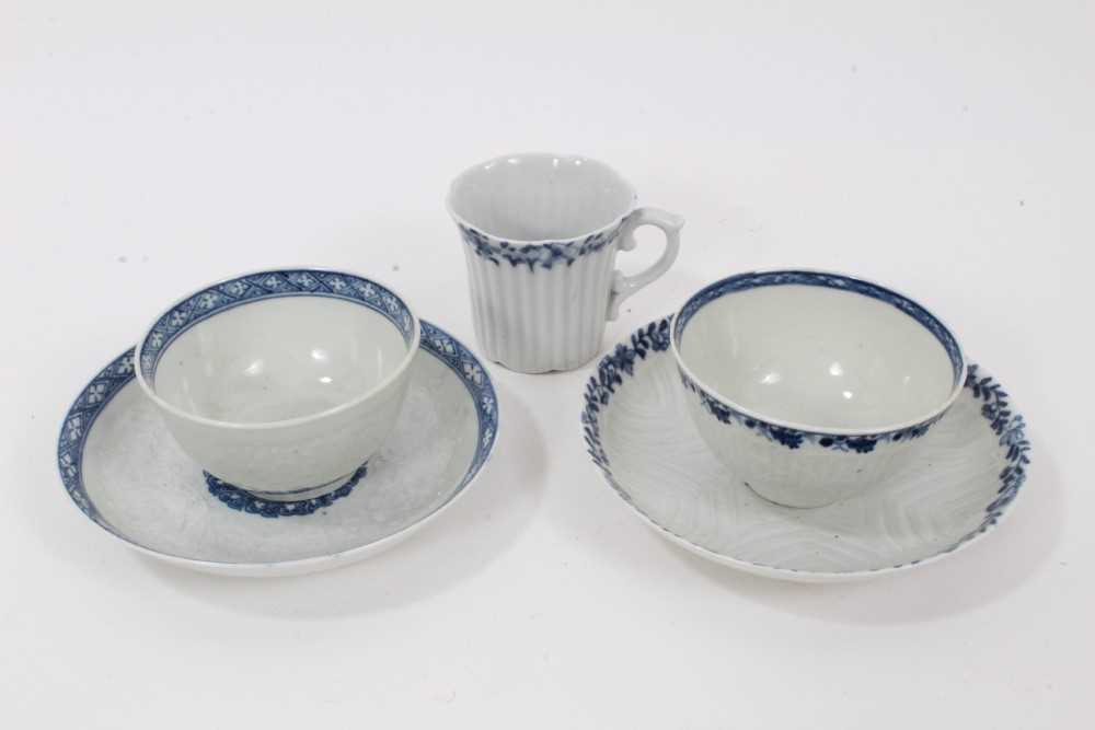 Worcester blue and white moulded tea wares, circa 1780, including a tea bowl and saucer with floral