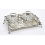 Late Edwardian silver ink stand of rectangular form, with pierced upstand and gadrooned borders