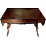 Regency mahogany and barber pole strung sofa table.