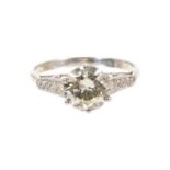 Diamond single stone ring with a round brilliant cut diamond estimated to weigh approximately 1.60