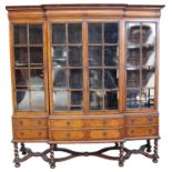 William & Mary revival walnut breakfront bookcase with seaweed marquetry inlaid decoration